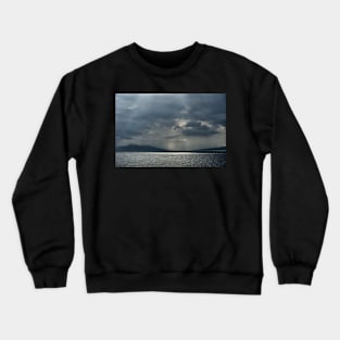 Darkness and light over the Isle of Arran Crewneck Sweatshirt